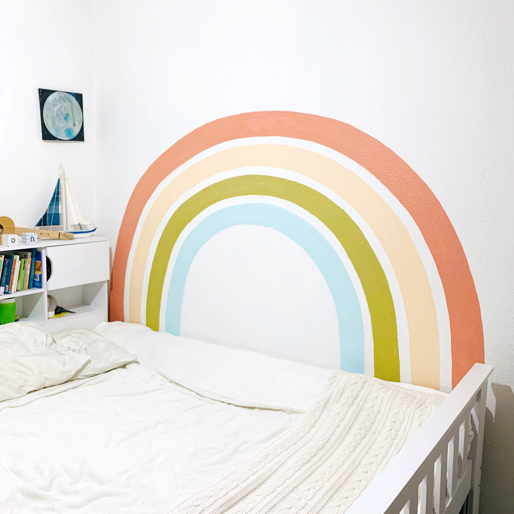 Rainbow mural in a child's room